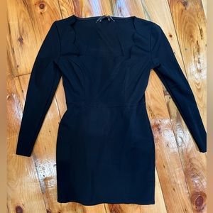 Scalloped neckline black mini dress